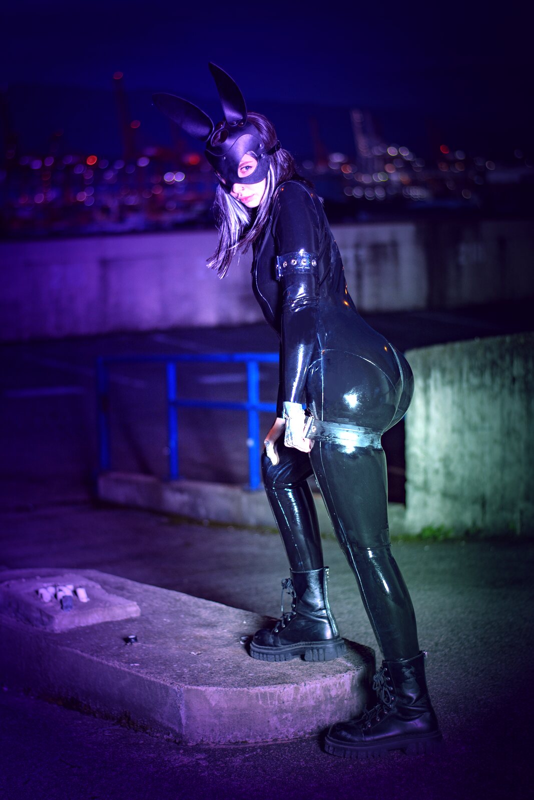 Mistress Mercy Rage in black latex at night — fly-me-to-you tours across Canada